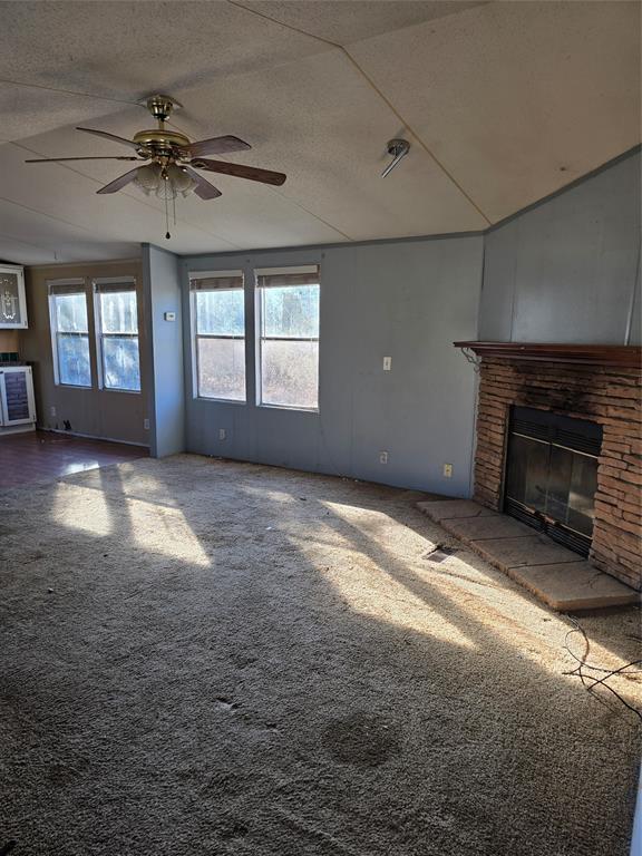 1903 VZ County Road Ben Wheeler, TX 75754 - Photo 14 of 35 an empty room with windows and fireplace