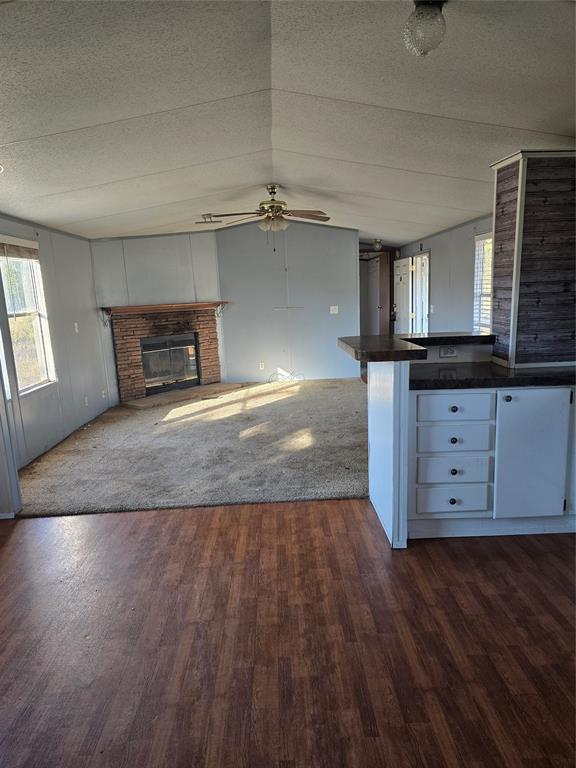 1903 VZ County Road Ben Wheeler, TX 75754 - Photo 19 of 35 an empty room with wooden floor and cabinet