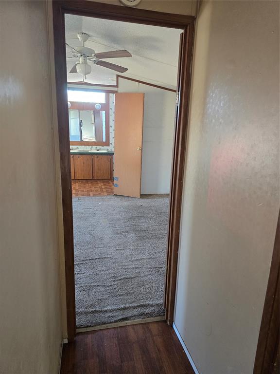 1903 VZ County Road Ben Wheeler, TX 75754 - Photo 21 of 35 an empty room with wooden floor mirror and windows
