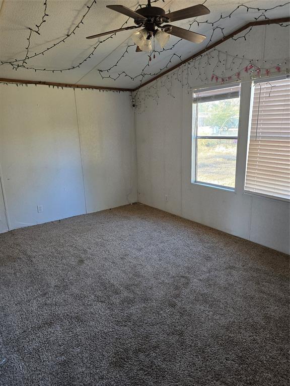 1903 VZ County Road Ben Wheeler, TX 75754 - Photo 34 of 35 an empty room with a ceiling fan and window