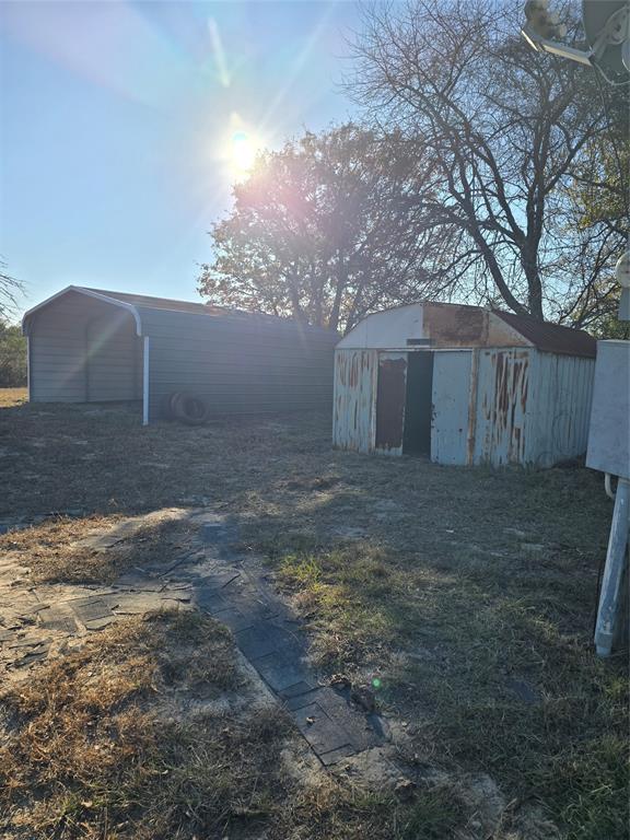 1903 VZ County Road Ben Wheeler, TX 75754 - Photo 6 of 35 a view of a yard with large trees