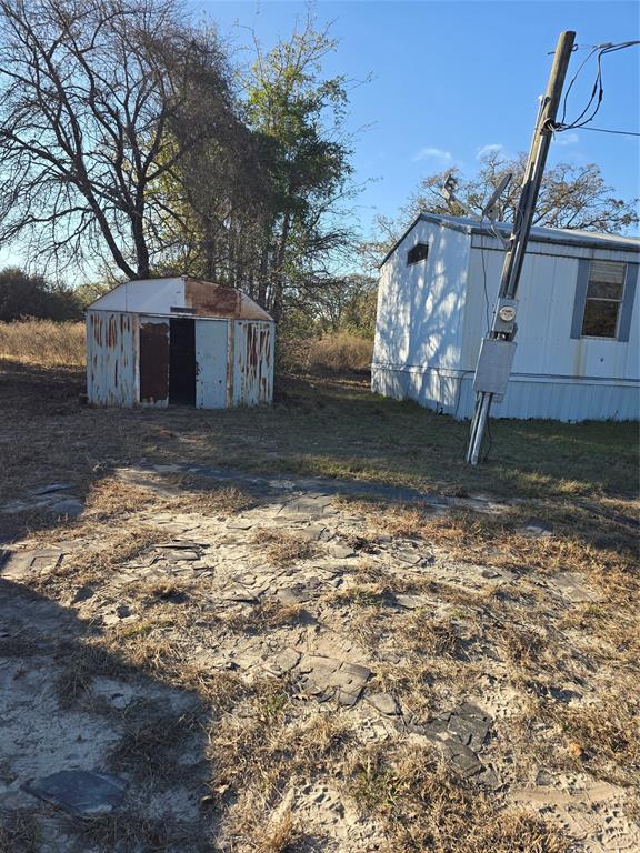 1903 VZ County Road Ben Wheeler, TX 75754 - Photo 7 of 35 a large tree in front of a house