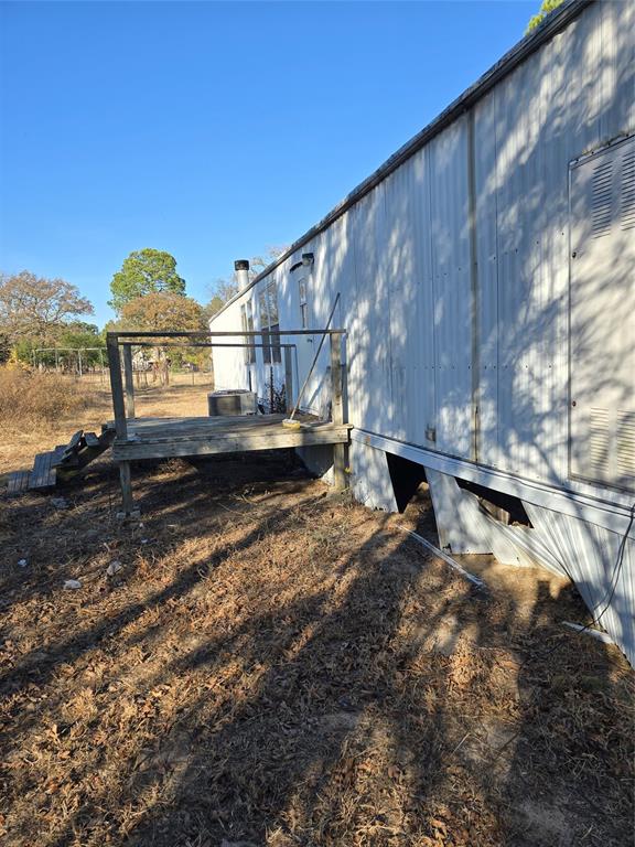 1903 VZ County Road Ben Wheeler, TX 75754 - Photo 9 of 35 a view of a yard with wooden fence