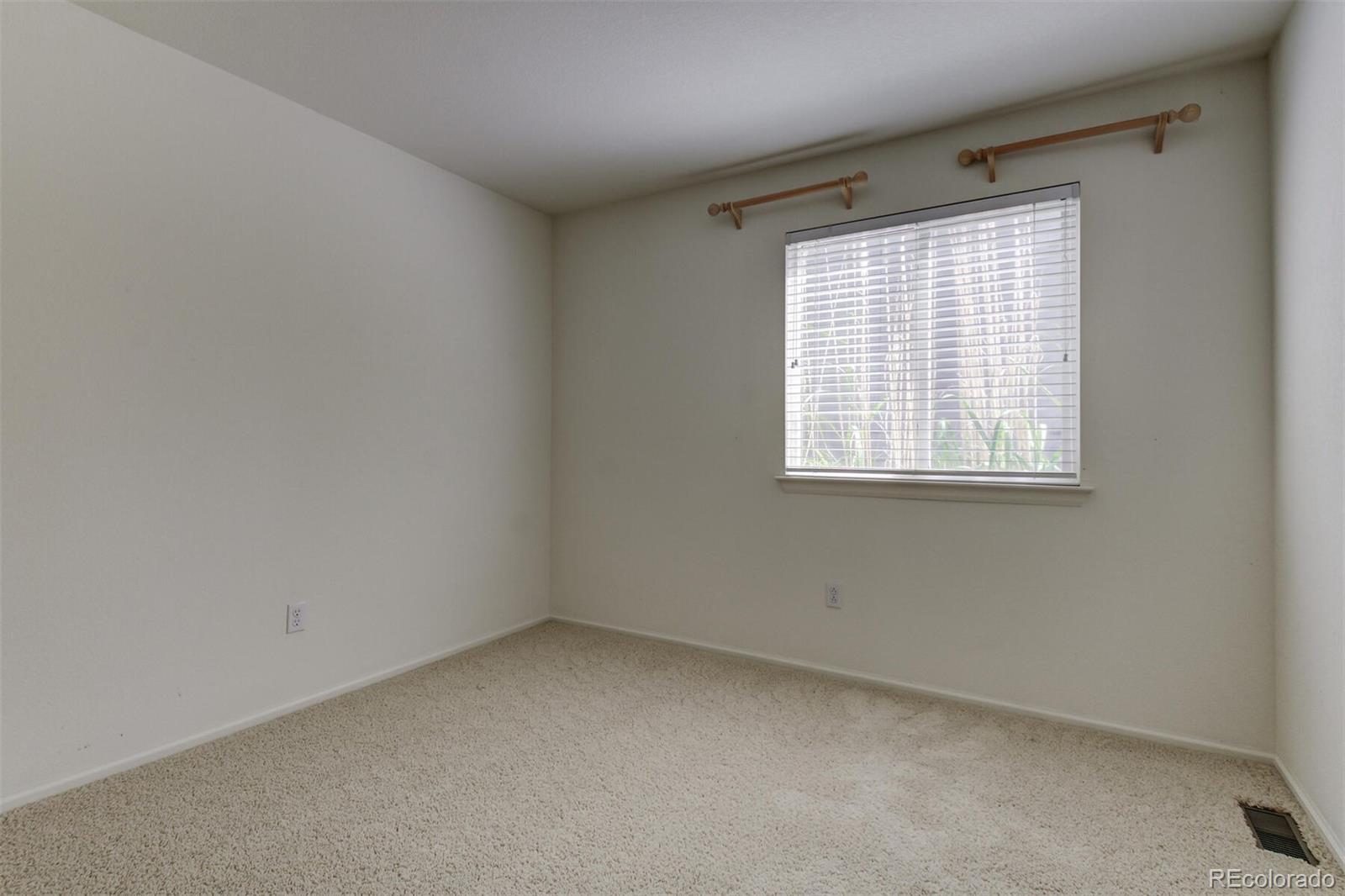 5555 South Rome Street Aurora, CO 80015 - Photo 23 of 34 an empty room with a window