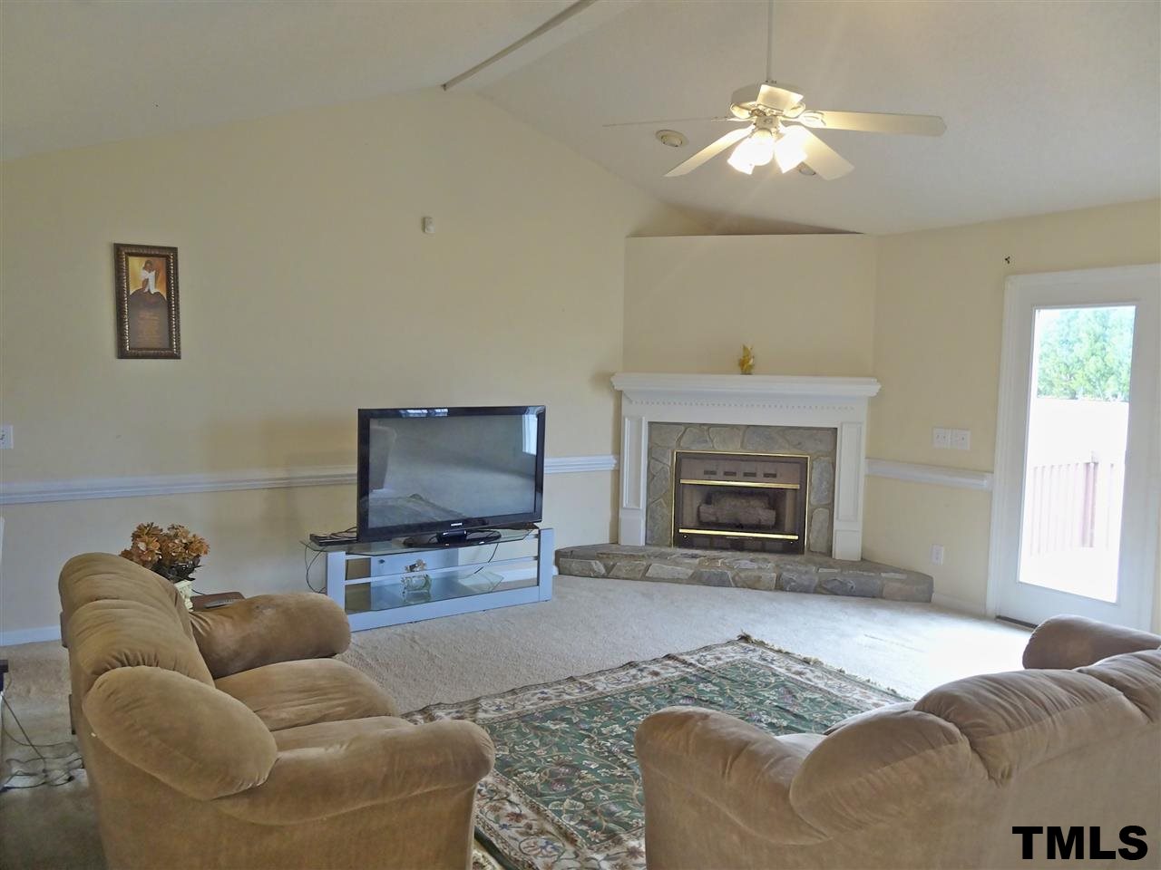 Open space, high ceilings, gas log fireplace... what more can one ask for?