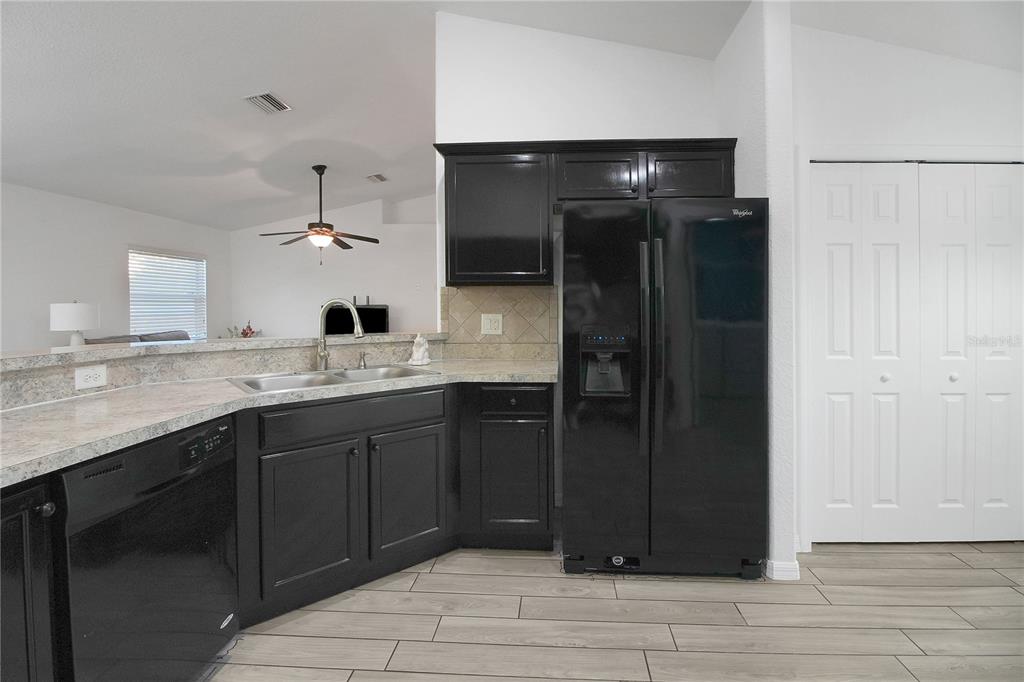314 Stone Castle Loop Lady Lake, FL 32159 - Photo 14 of 42 a bathroom with a sink and a mirror