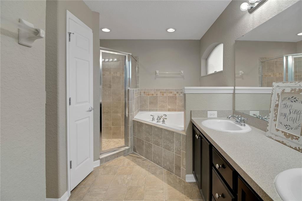 314 Stone Castle Loop Lady Lake, FL 32159 - Photo 22 of 42 a bathroom with a sink a toilet and shower
