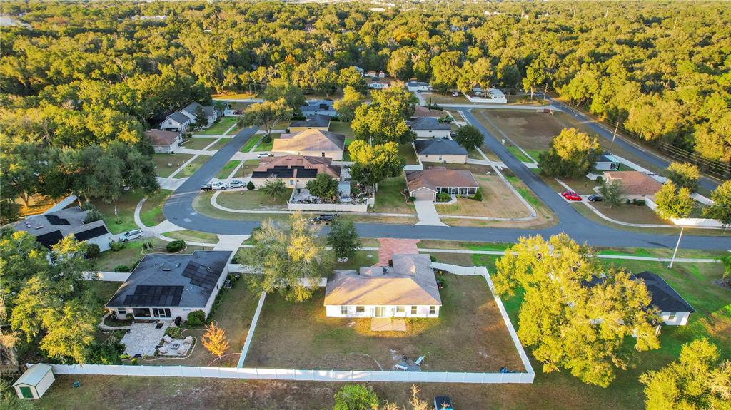 314 Stone Castle Loop Lady Lake, FL 32159 - Photo 3 of 42 an aerial view of a house with a yard swimming pool and outdoor seating