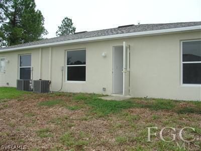 2134 Armour Road Lehigh Acres, FL 33973 - Photo 10 of 10 a house with a outdoor space