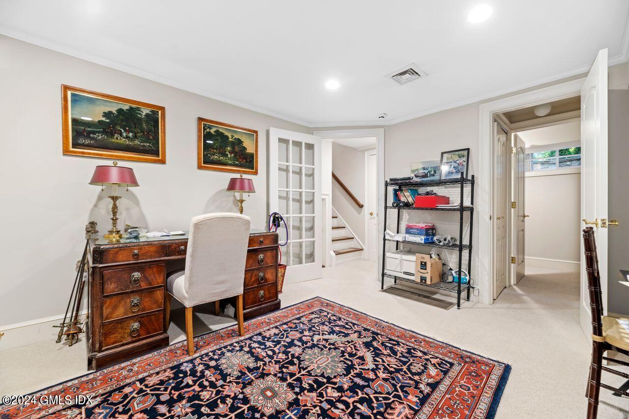 43 Maple Avenue, Unit 2 Greenwich, CT 06830 - Photo 11 of 17 a living room with furniture and a couch