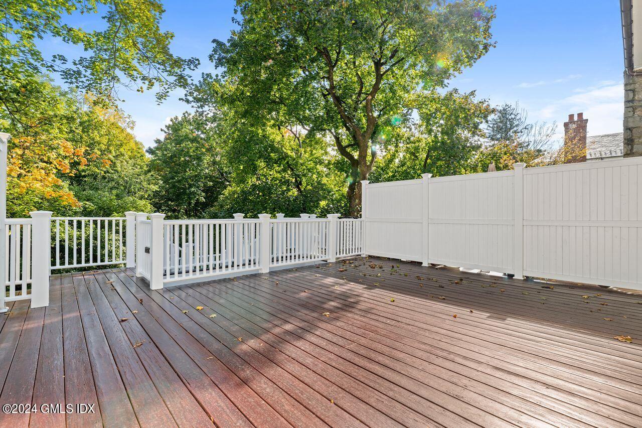 43 Maple Avenue, Unit 2 Greenwich, CT 06830 - Photo 12 of 17 a view of a wooden deck