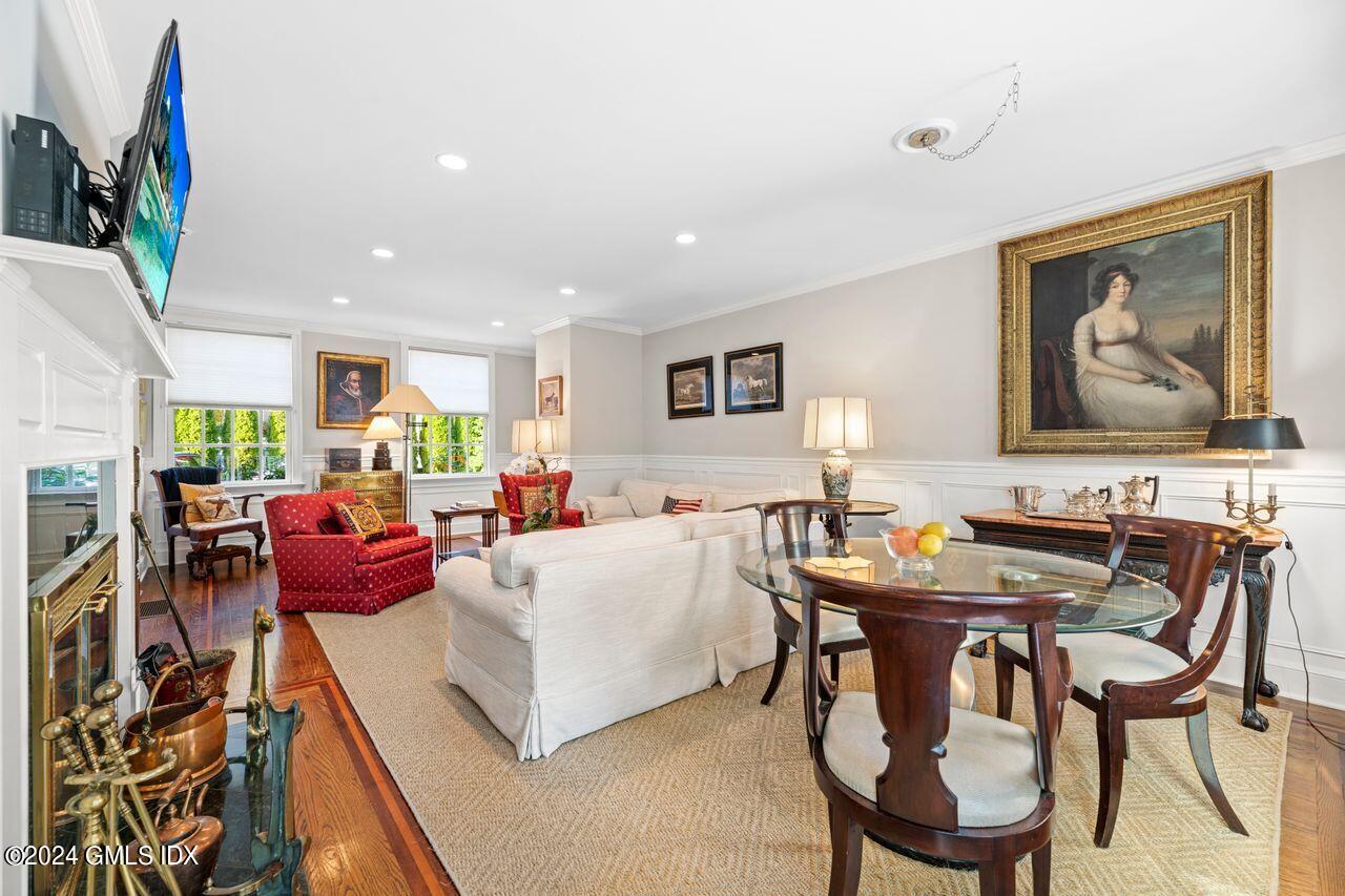 43 Maple Avenue, Unit 2 Greenwich, CT 06830 - Photo 4 of 17 a living room with furniture and a flat screen tv