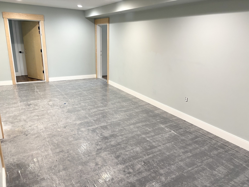 1391 Main Street, Unit 208 Walpole, MA 02081 - Photo 30 of 36 a view of an empty room