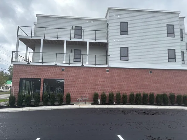 a view of a house with a street