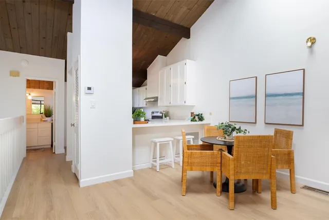 a view of a dining room with furniture