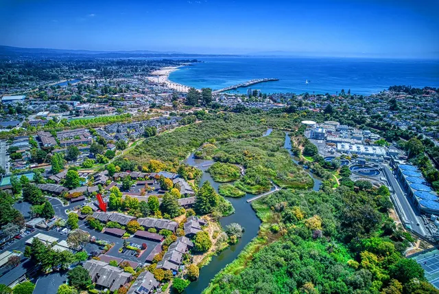 a view of a city with an ocean
