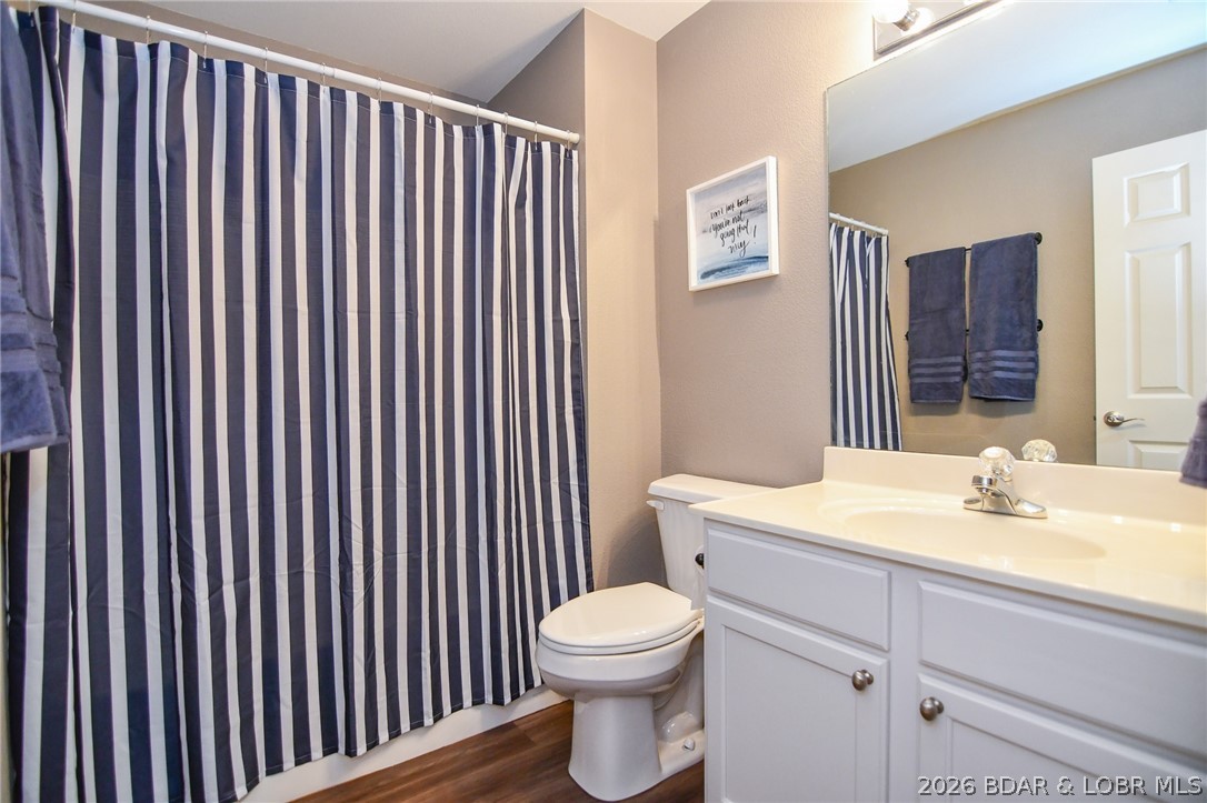 194 Sac Road, Unit D301 Sunrise Beach, MO 65079 - Photo 29 of 43 Guest bathroom near entry of condo