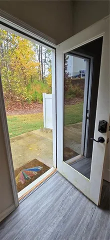 a view of a field with an trees