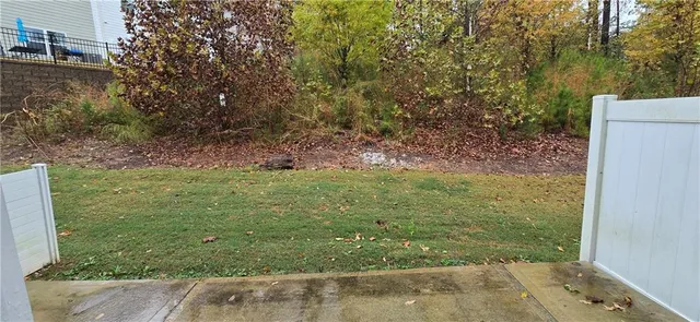 a bathroom with a sink mirror and toilet
