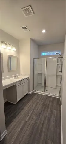 a view of entryway with wooden floor