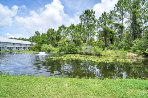 a view of a lake with a big yard