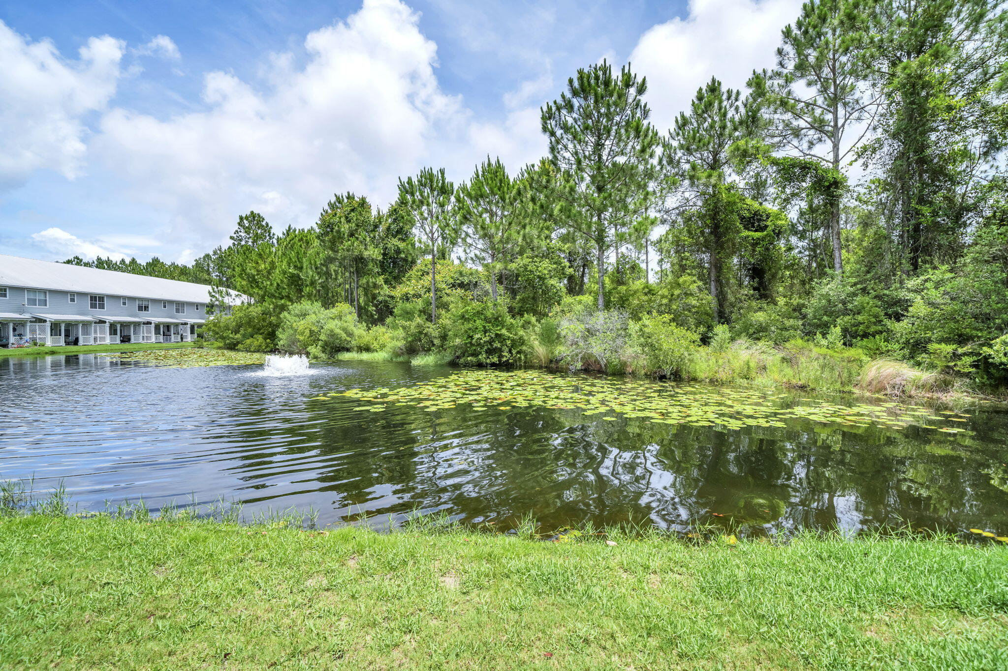 159 Golden Eagle Court, Unit 3C Santa Rosa Beach, FL 32459 - Photo 20 of 34 a view of a lake with a big yard