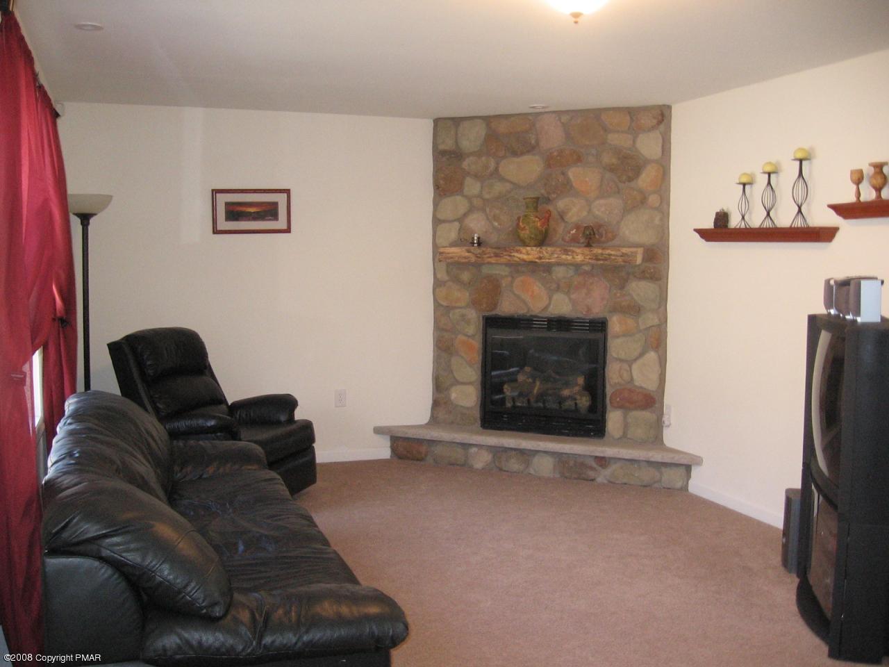 31 Spring Run Lane Cresco, PA 18326 - Photo 3 of 14 Living room w/fireplace