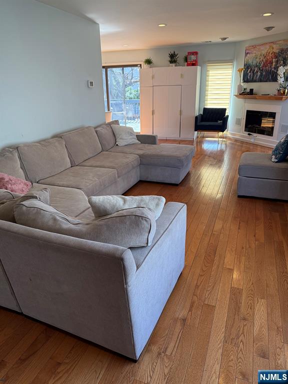 768 Dearborn Street Teaneck, NJ 07666 - Photo 3 of 10 a living room with furniture and a fireplace