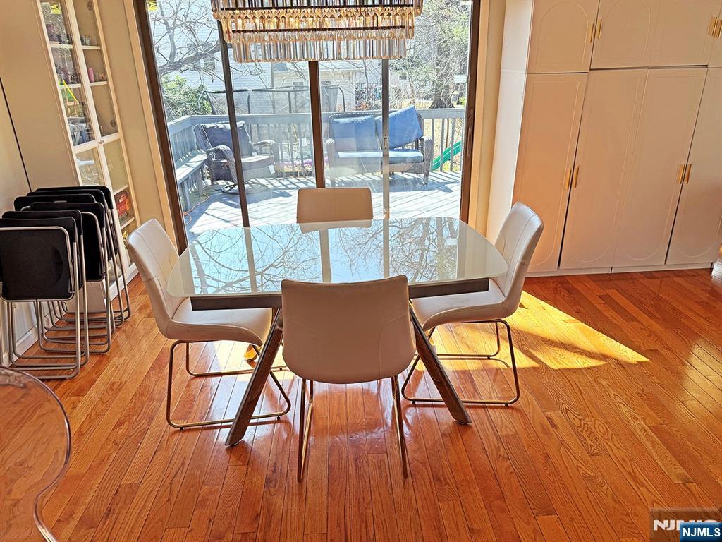 768 Dearborn Street Teaneck, NJ 07666 - Photo 5 of 10 a view of a dining room with furniture and wooden floor