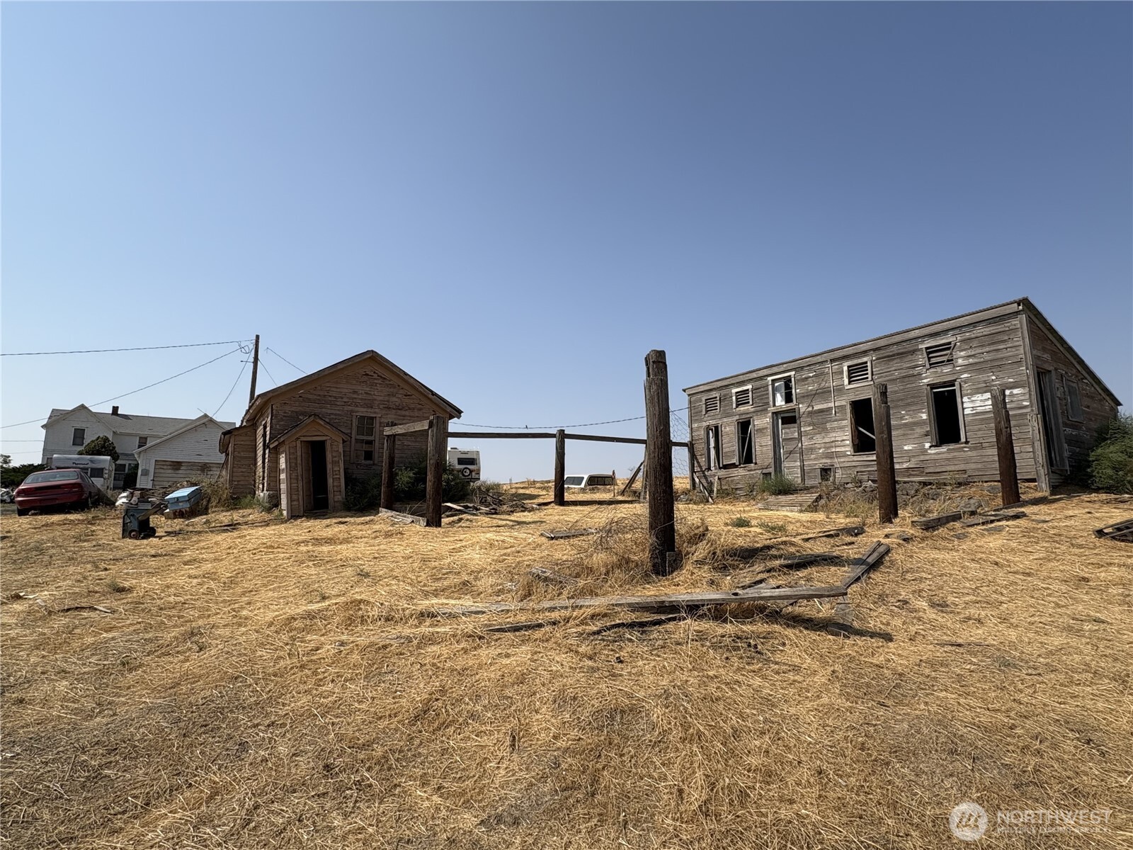 1225 North Marcellus Road Ritzville, WA 99169 - Photo 31 of 40 a big house with large windows and a yard