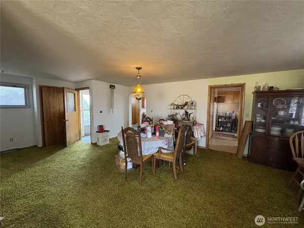 a dining room with furniture and a livingroom