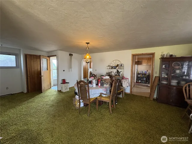 a dining room with furniture and a livingroom