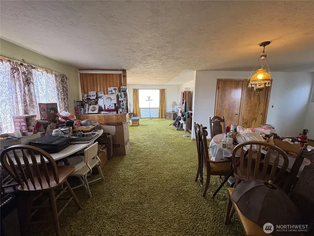 a view of a livingroom and dining room