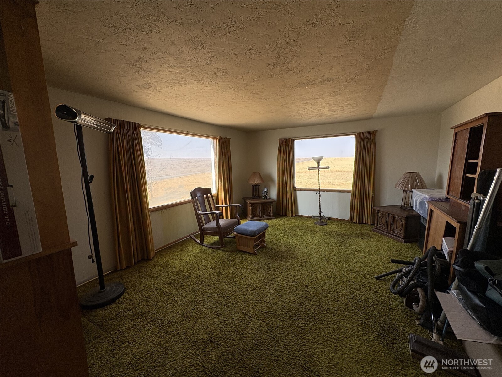 1225 North Marcellus Road Ritzville, WA 99169 - Photo 10 of 40 a view of a room with gym equipment and a large window