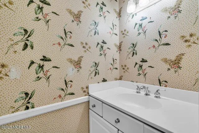 a bathroom with a sink and a bathtub