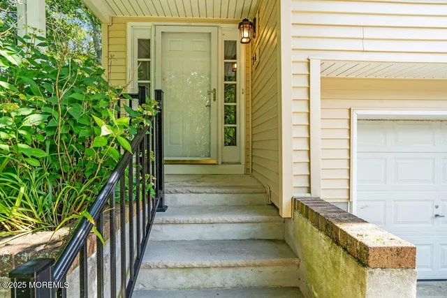 a view of balcony with potted plants
