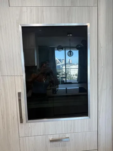 a bathroom with a mirror