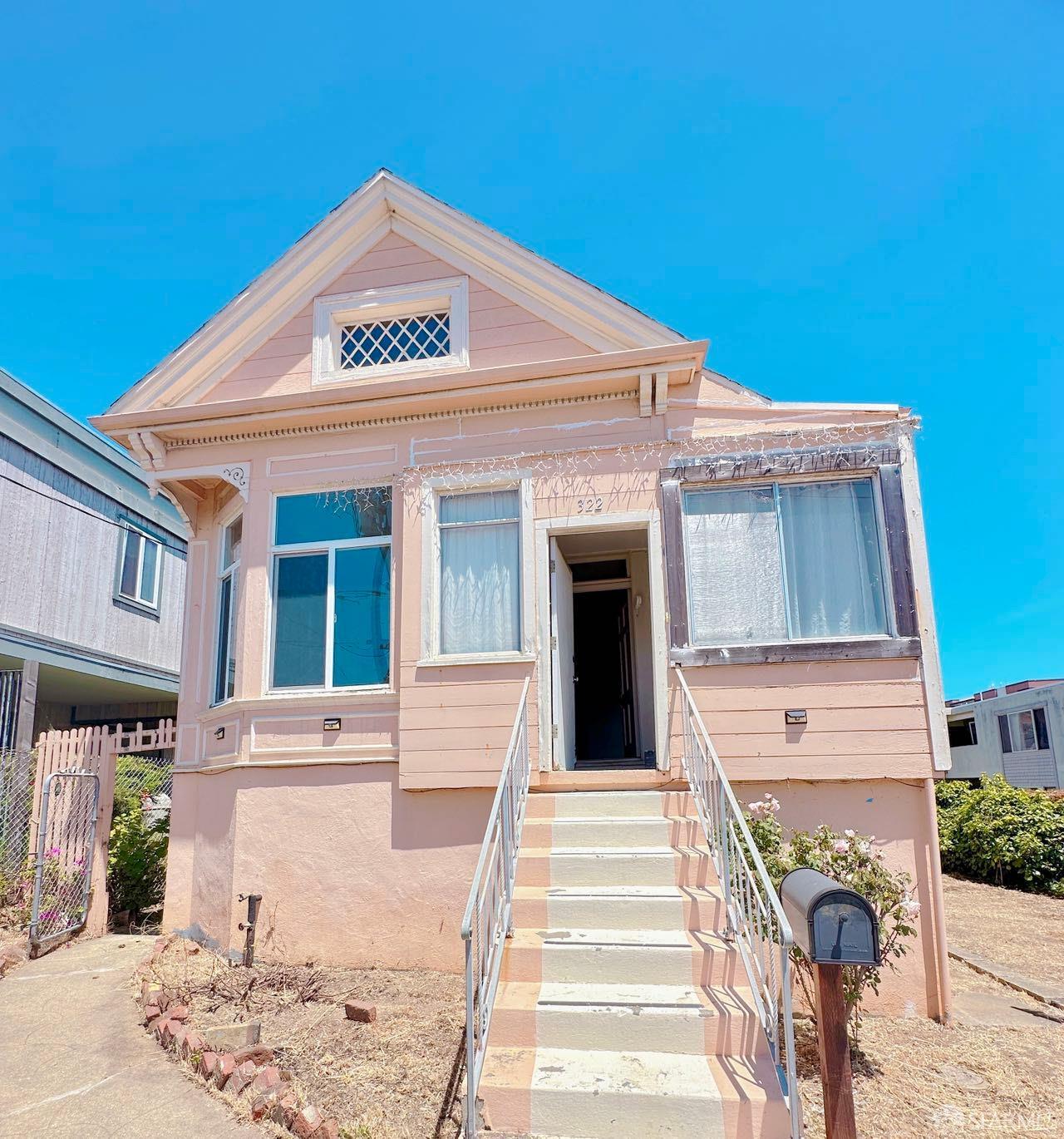 322 Commercial Avenue South San Francisco, CA 94080 - Photo 1 of 32 a front view of a house with a small garden
