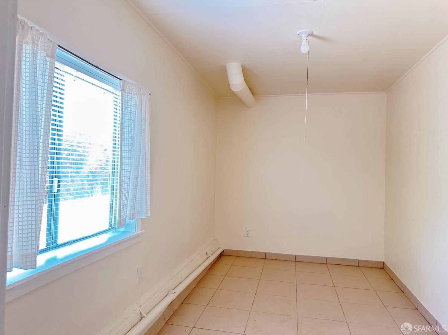 322 Commercial Avenue South San Francisco, CA 94080 - Photo 12 of 32 a view of an empty room with a window