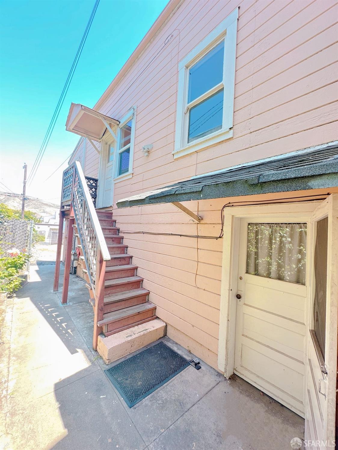 322 Commercial Avenue South San Francisco, CA 94080 - Photo 16 of 32 a view of a house with a staircase