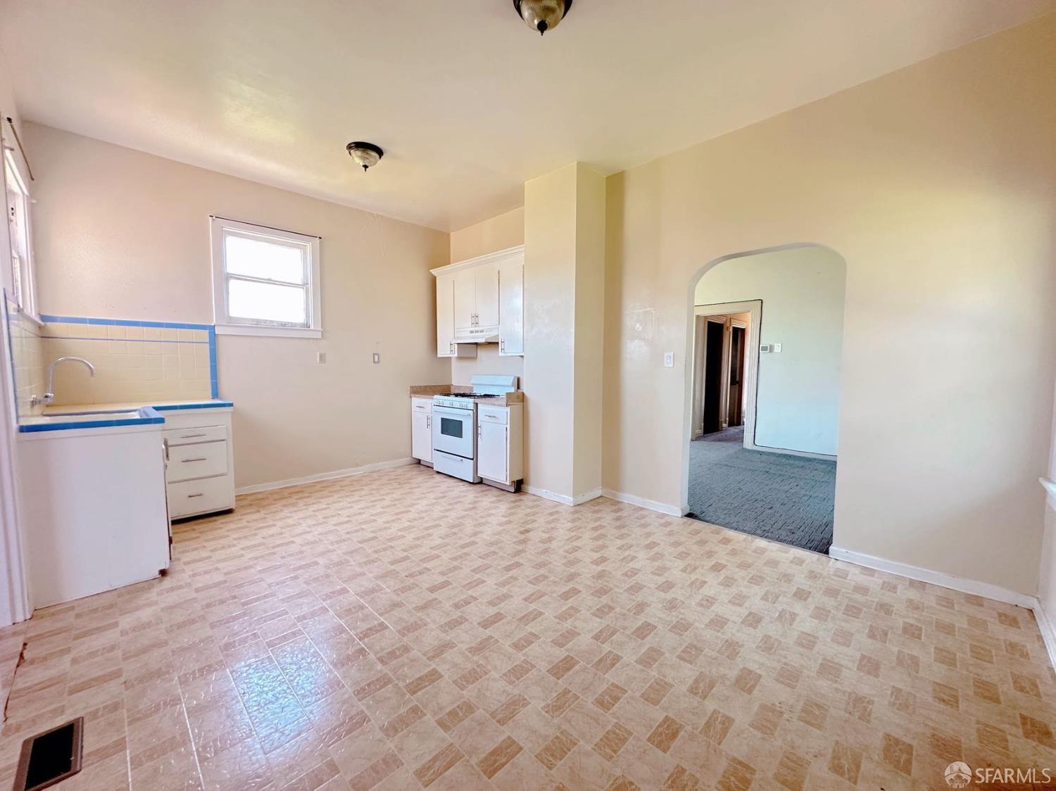 322 Commercial Avenue South San Francisco, CA 94080 - Photo 18 of 32 a bedroom with a bed and a dresser