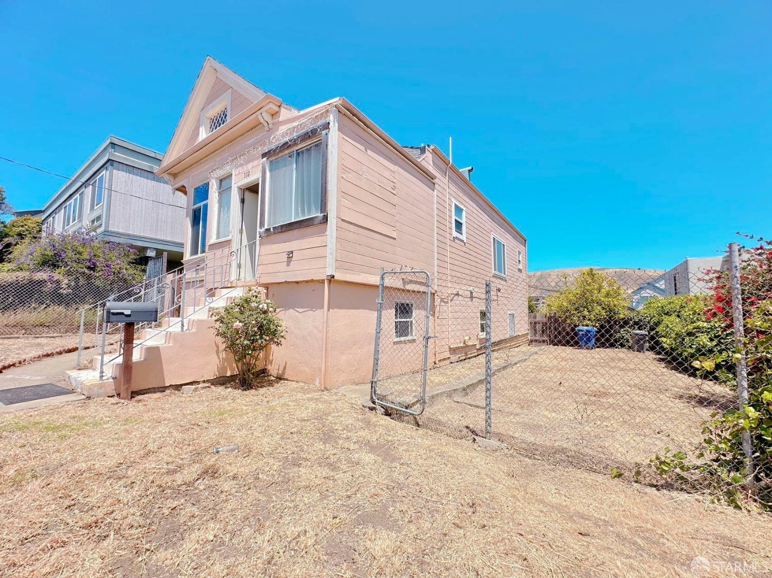 322 Commercial Avenue South San Francisco, CA 94080 - Photo 2 of 32 a view of a house with a yard