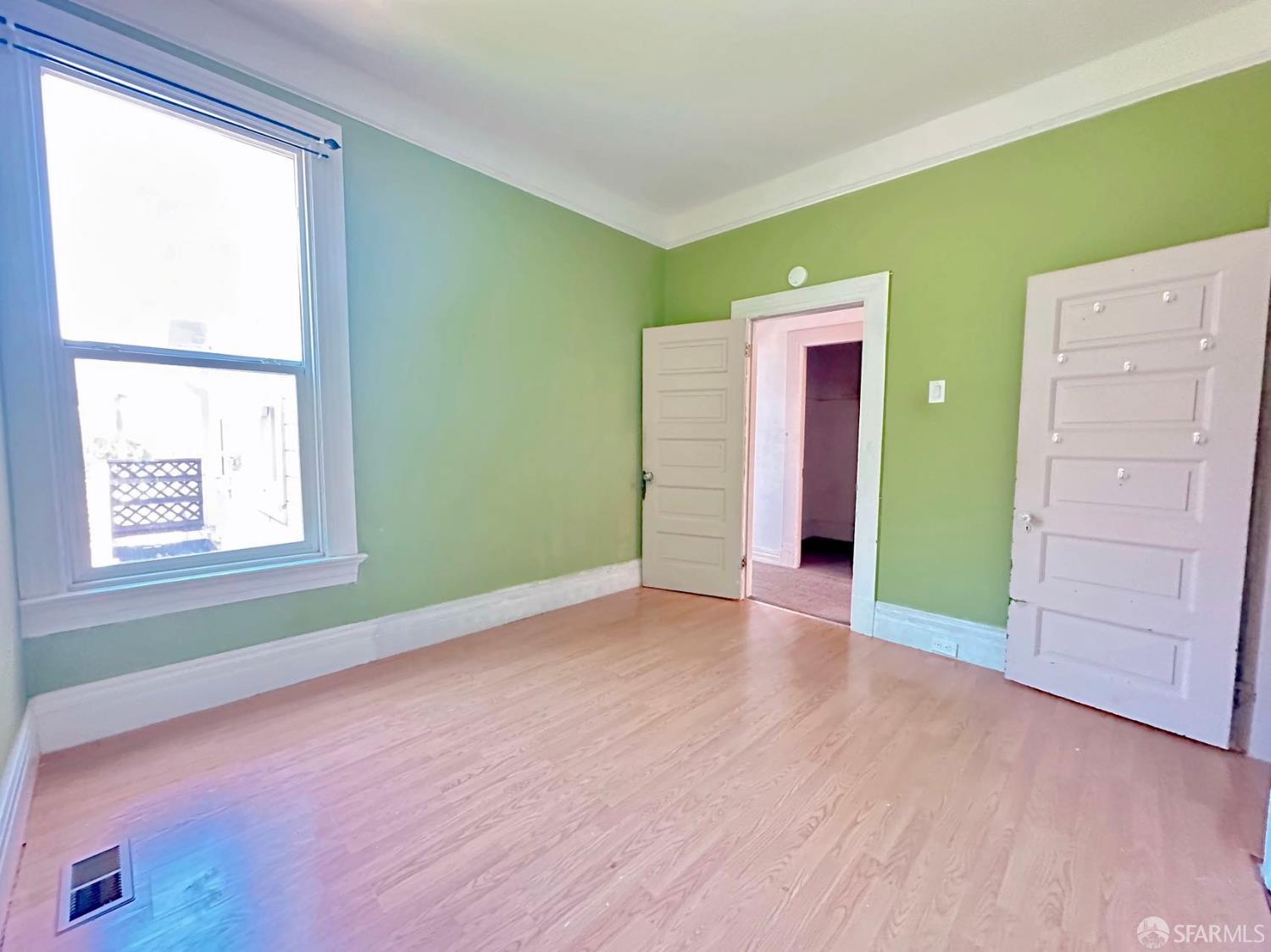 322 Commercial Avenue South San Francisco, CA 94080 - Photo 24 of 32 an empty room with closet and a window