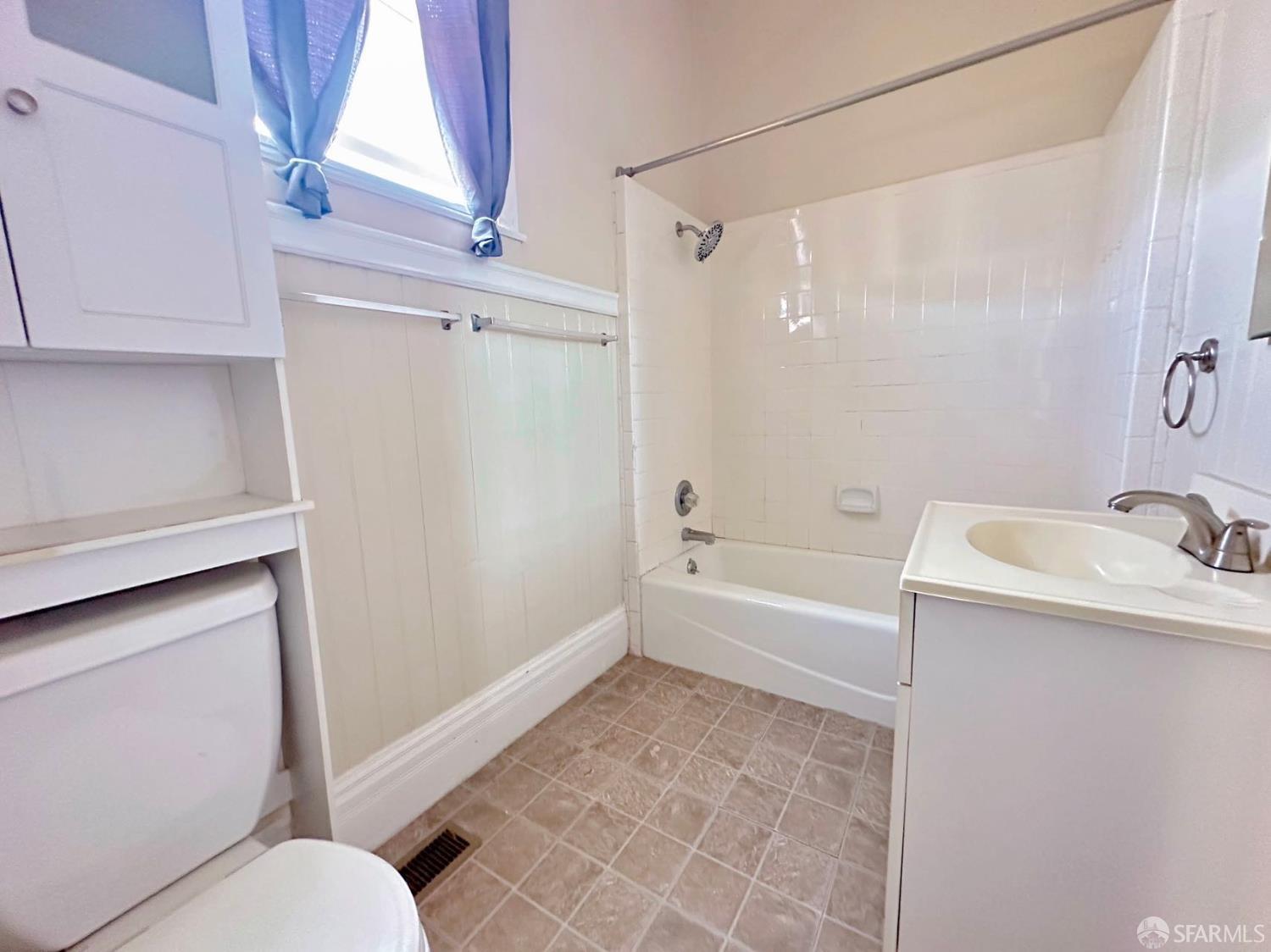 322 Commercial Avenue South San Francisco, CA 94080 - Photo 25 of 32 a bathroom with a sink a toilet and shower
