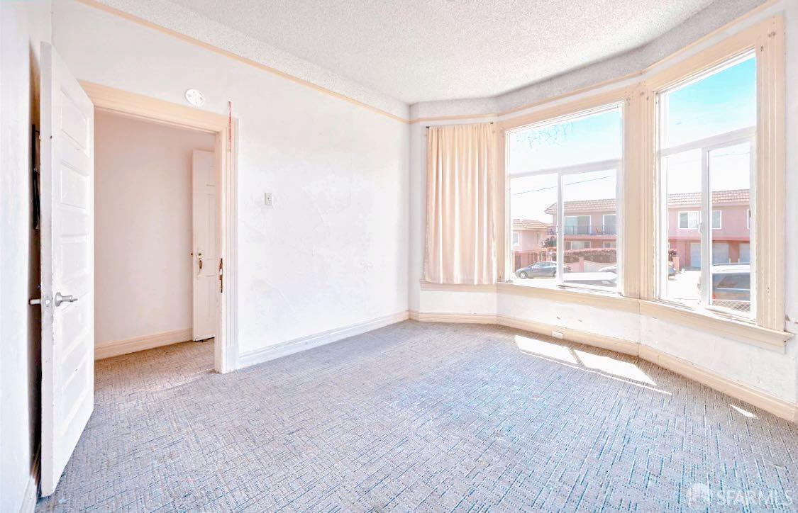 322 Commercial Avenue South San Francisco, CA 94080 - Photo 4 of 32 a view of an empty room with a window