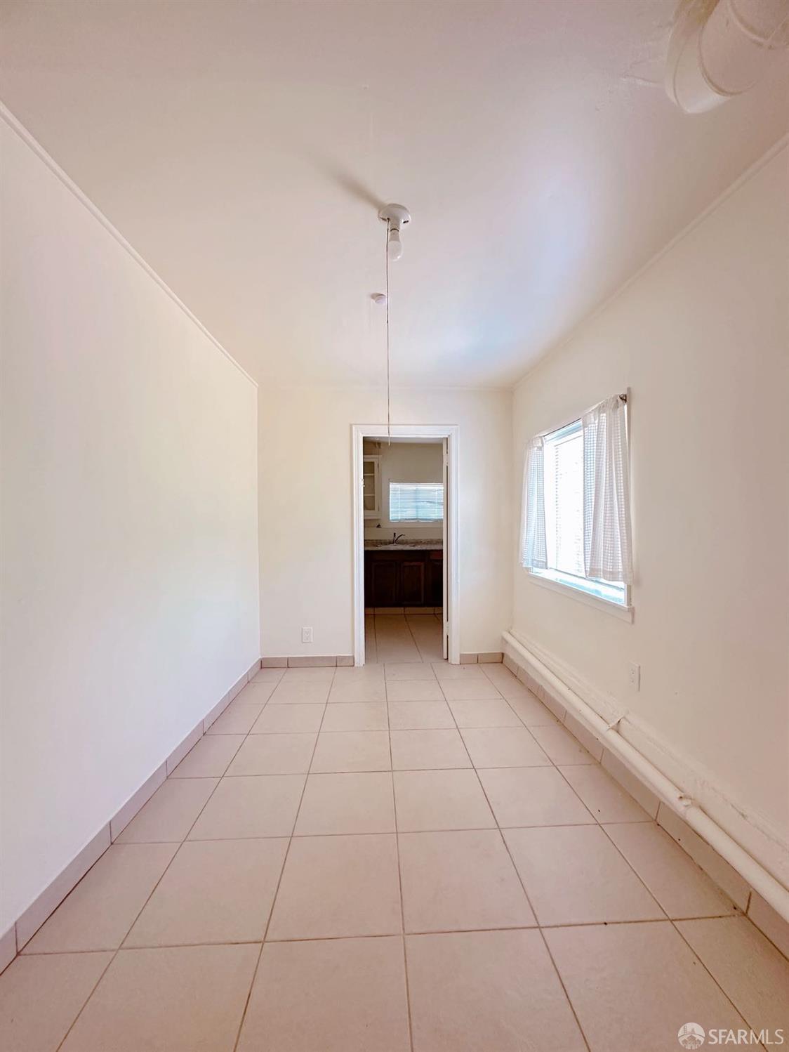 322 Commercial Avenue South San Francisco, CA 94080 - Photo 8 of 32 a view of an empty room with a window