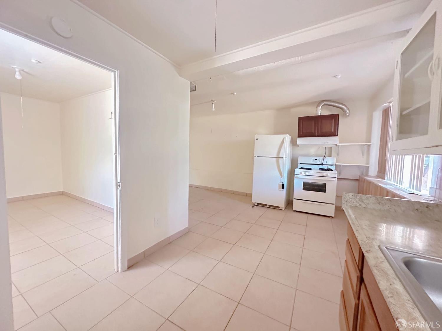 322 Commercial Avenue South San Francisco, CA 94080 - Photo 9 of 32 a view of kitchen with furniture and electronic appliances