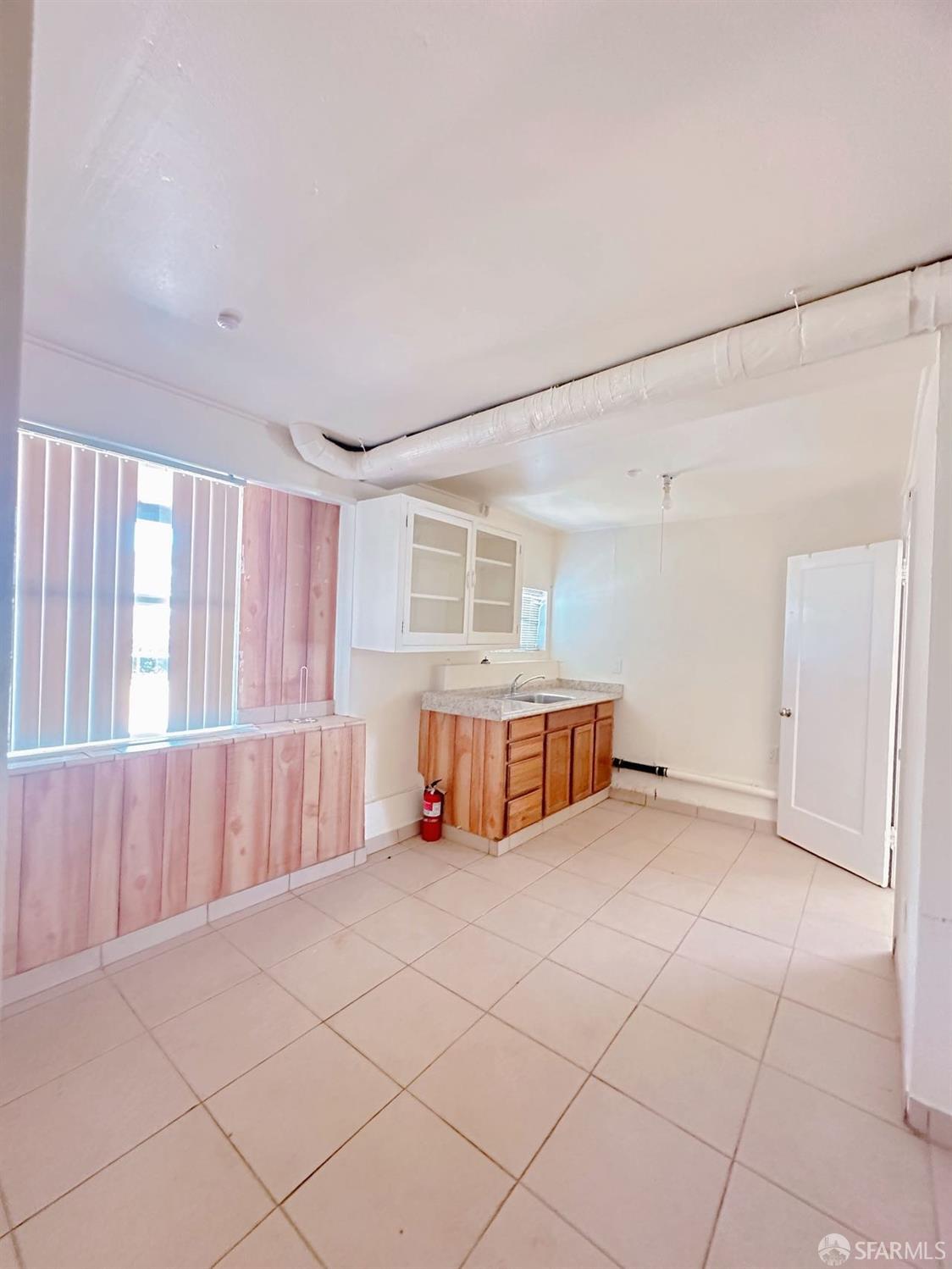 322 Commercial Avenue South San Francisco, CA 94080 - Photo 10 of 32 a view of an empty room with a window