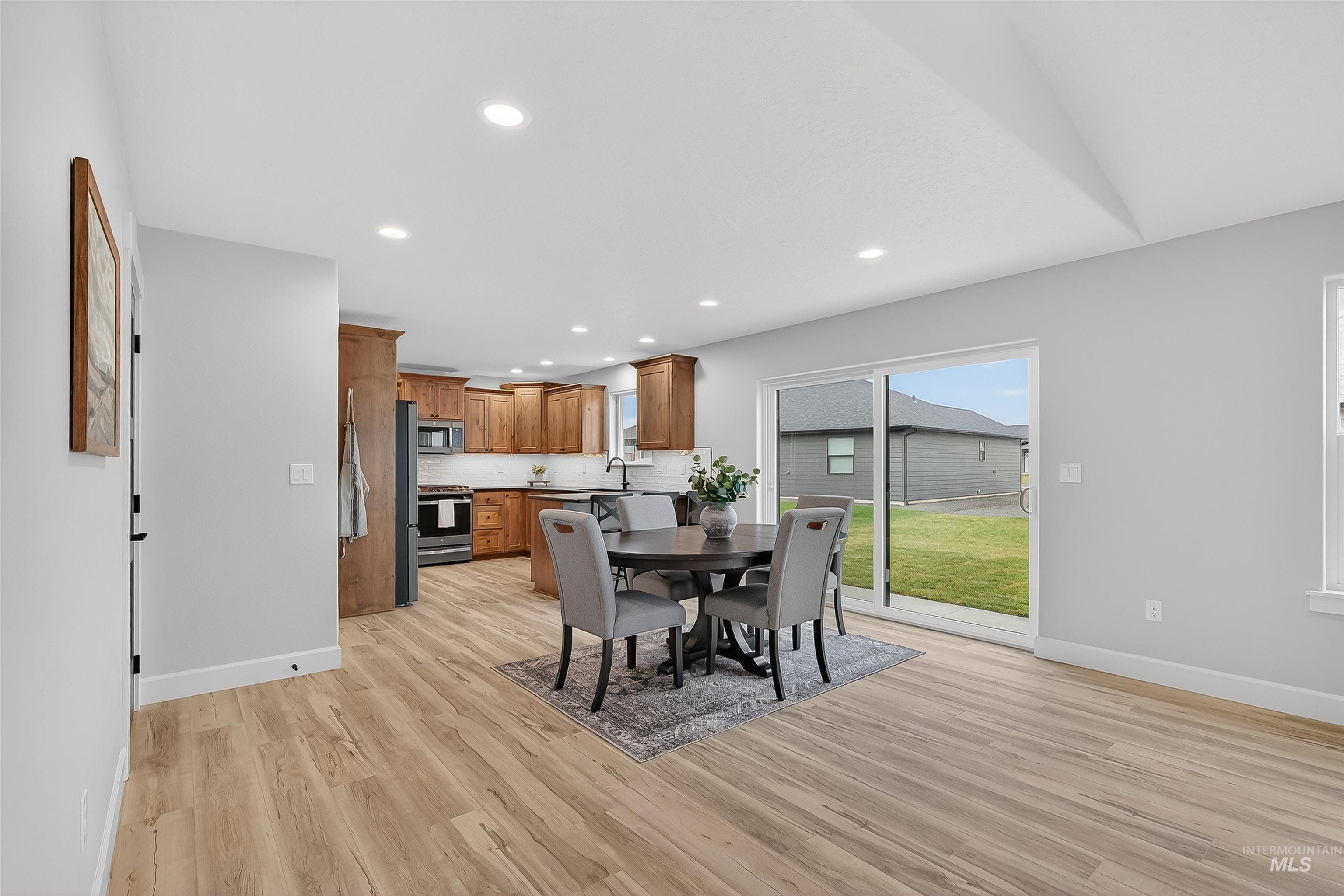 1725 Pathway Court Lewiston, ID 83501 - Photo 11 of 37 Dining space featuring recessed lighting and light wood finished floors