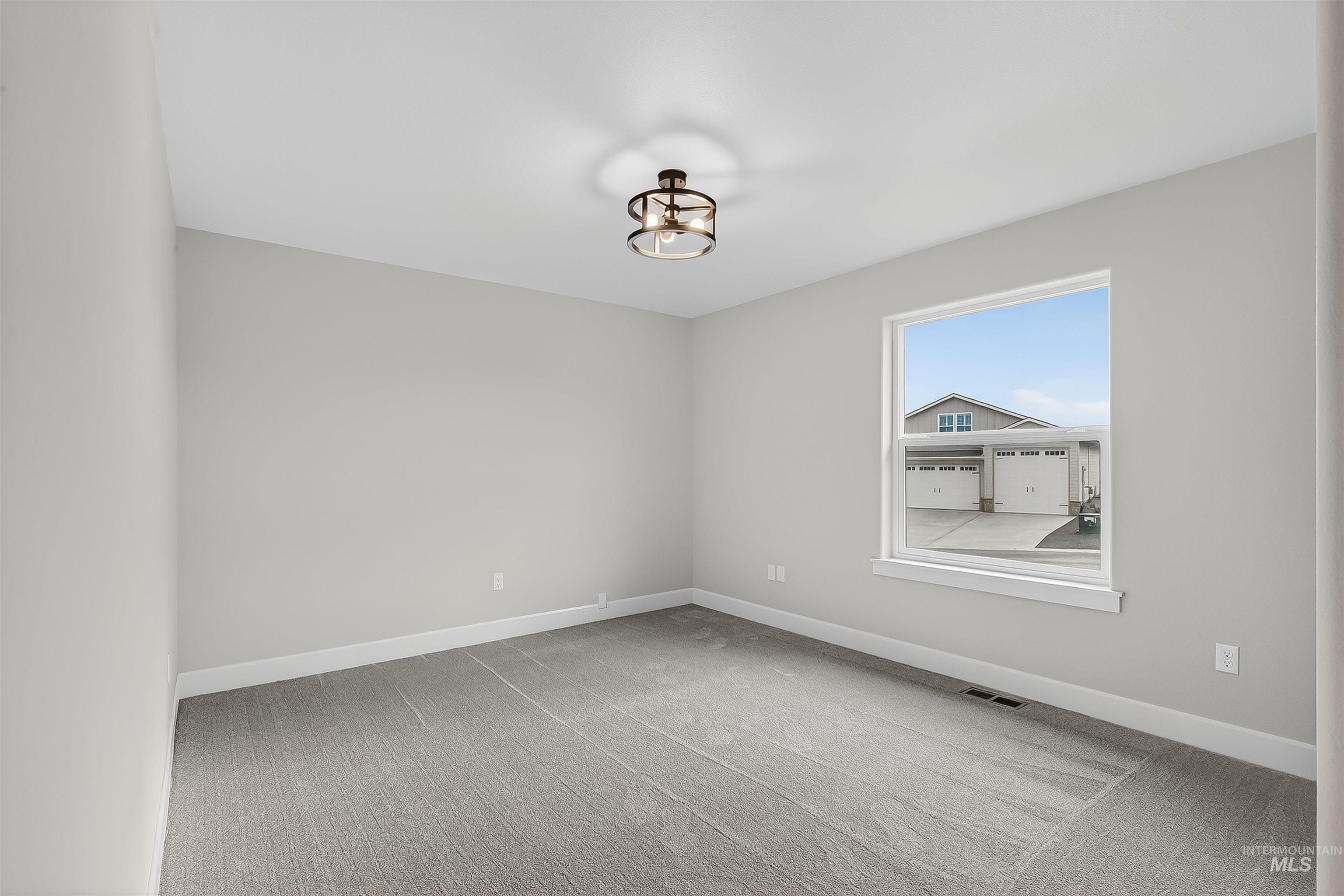 1725 Pathway Court Lewiston, ID 83501 - Photo 28 of 37 Spare room with light colored carpet